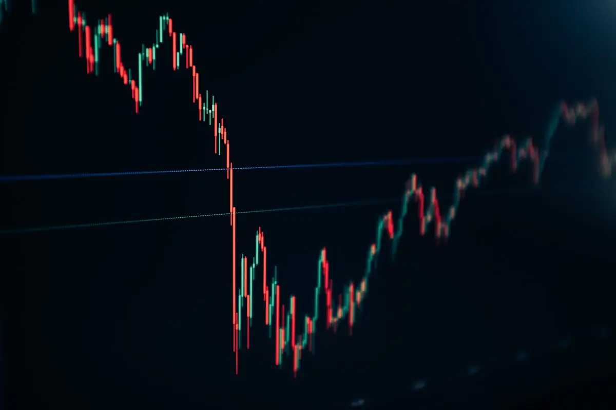 Price candles falling and rising on a trading screen