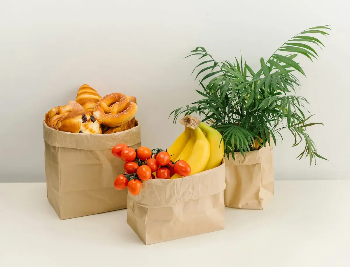 Paper bags of bread, fruit and vegetables