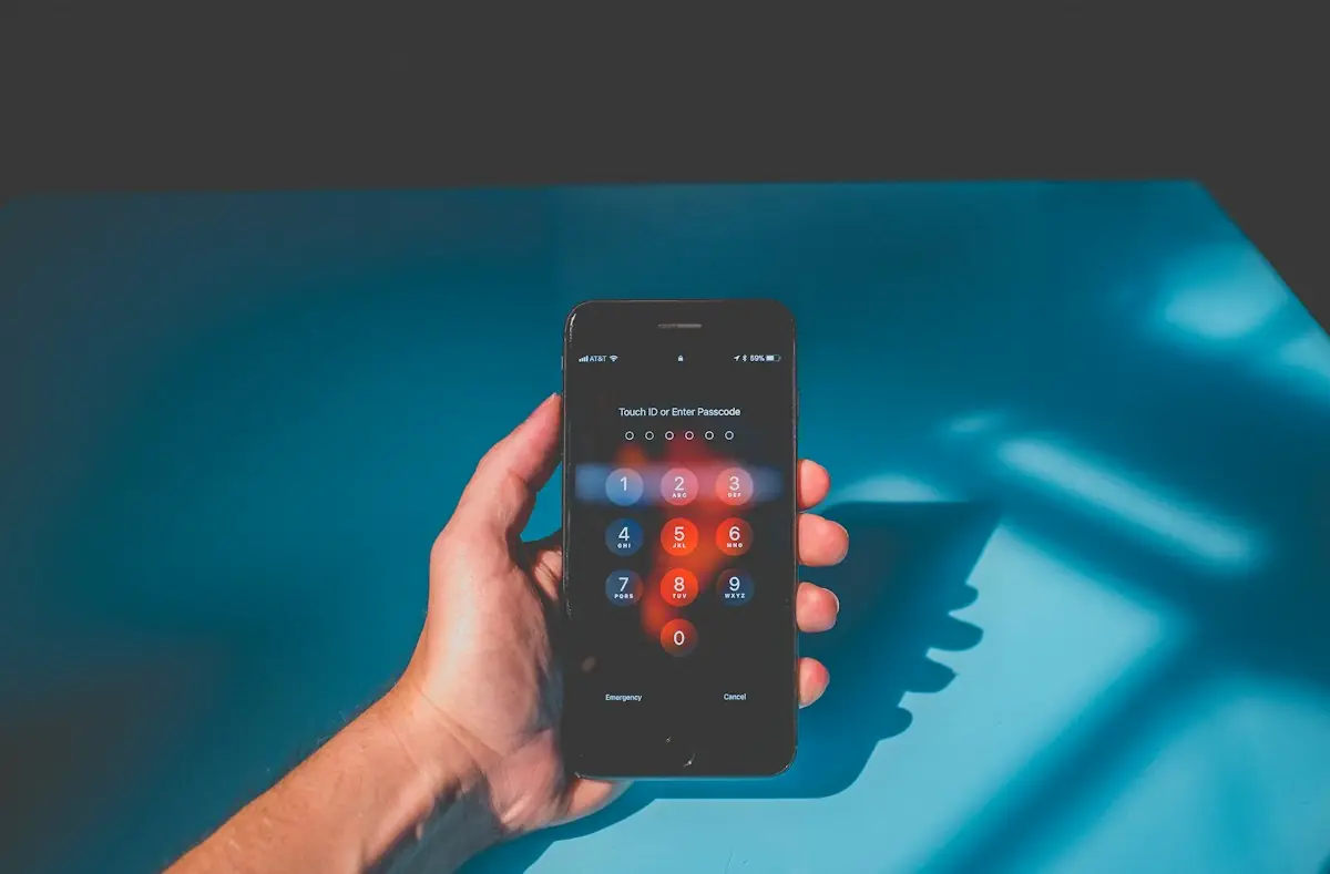 A phone showing a passcode keypad