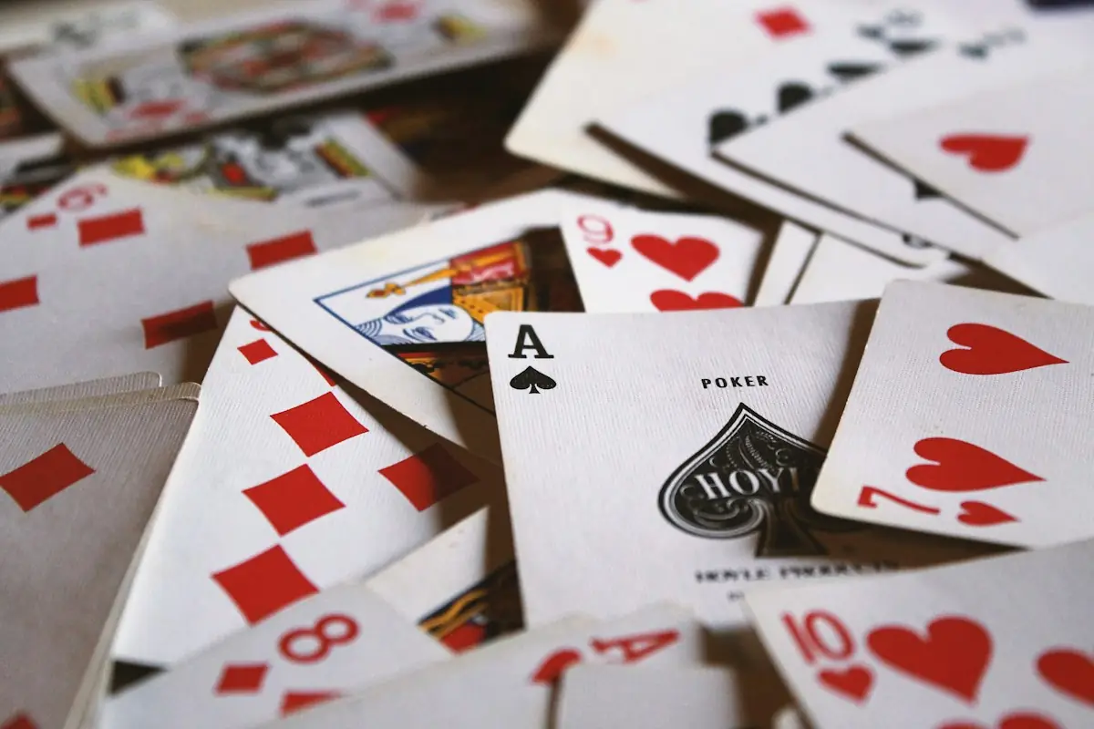 Playing cards scattered across a table