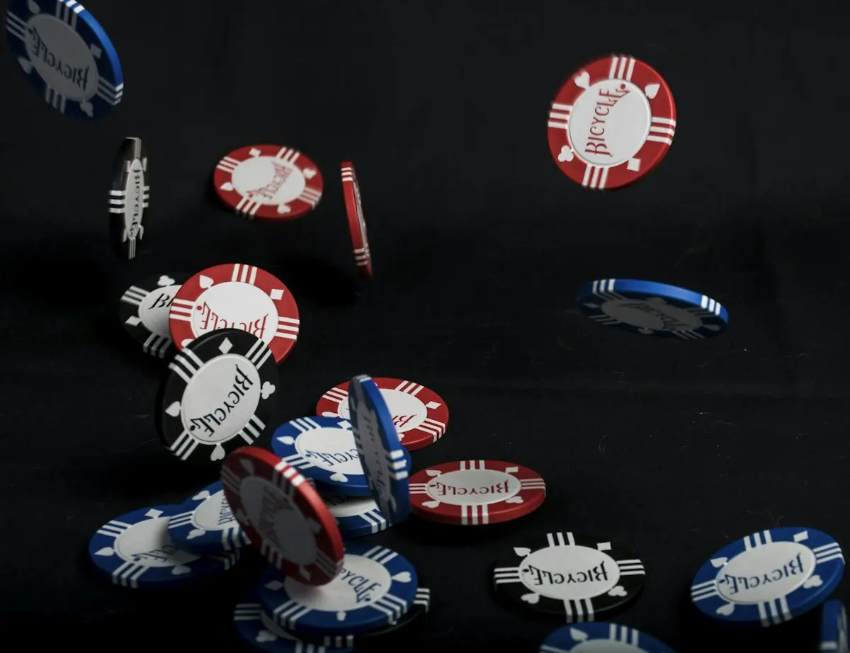 Poker chips tumbling through the air