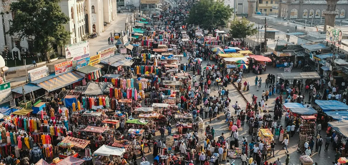 A crowded Indian market street seen from above