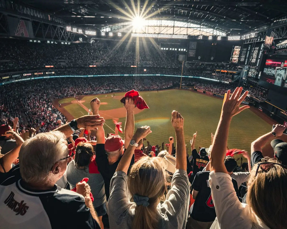 Fans cheering in a stadium