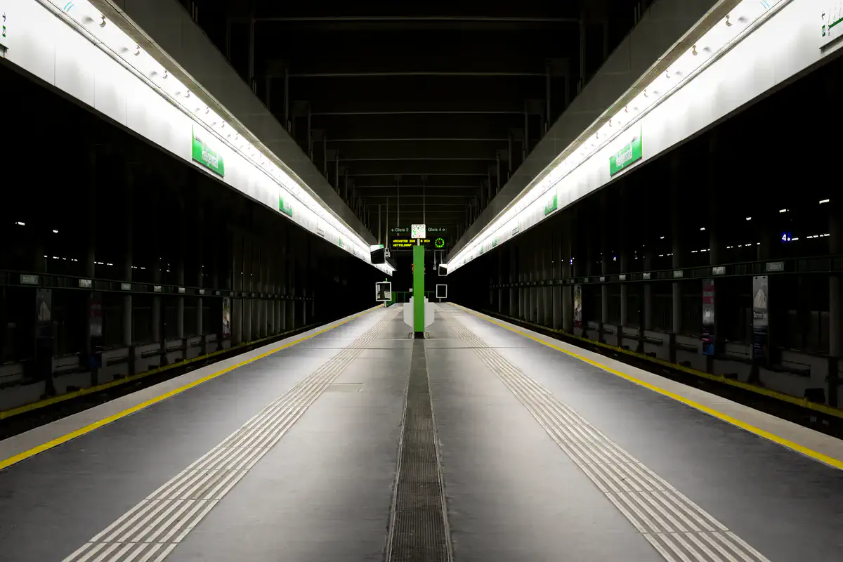 An empty, symmetrical metro platform